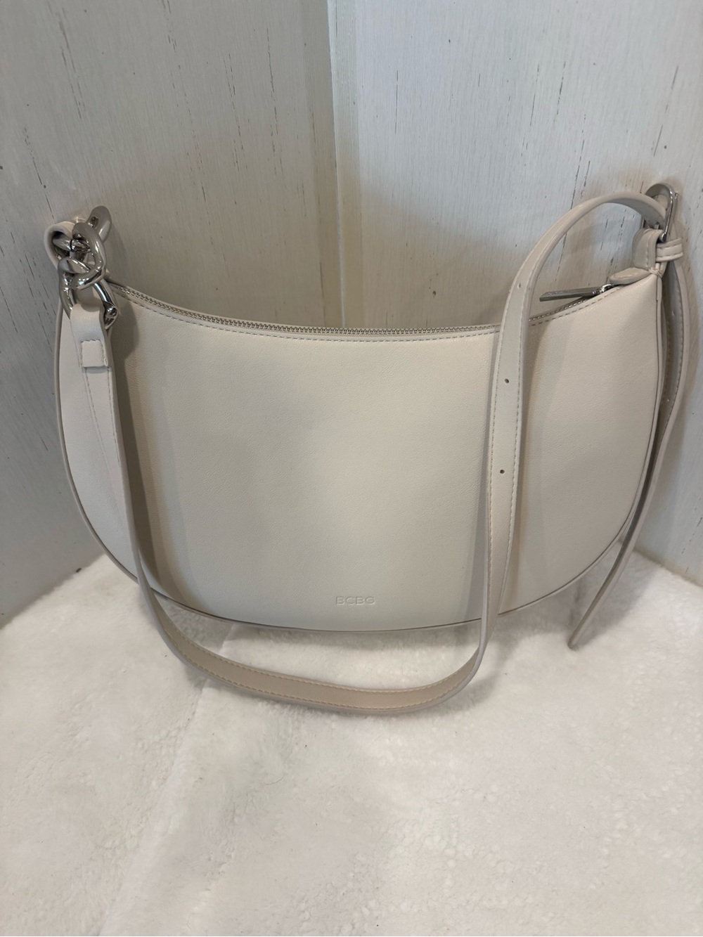 BCBG Cream Crescent Shoulder Bag with Silver Hardware Adjustable Strap